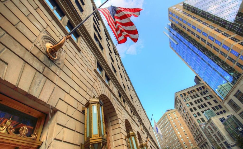 a view of multiple high rises in Boston city to represent where to stay during Boston trips