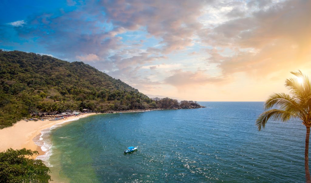 Puerto Vallarta, on of the best beaches in Mexico, sunsets and scenic ocean views near Bay of Banderas coastline.