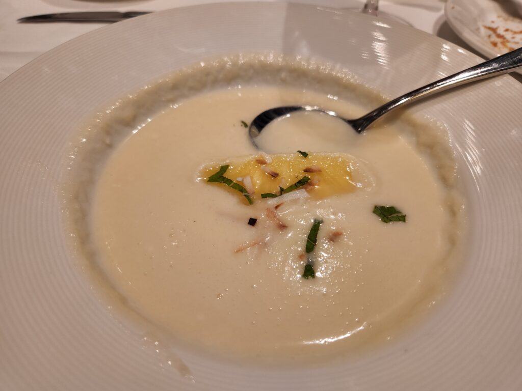 Chilled Pina Colada Soup with pineapple on top