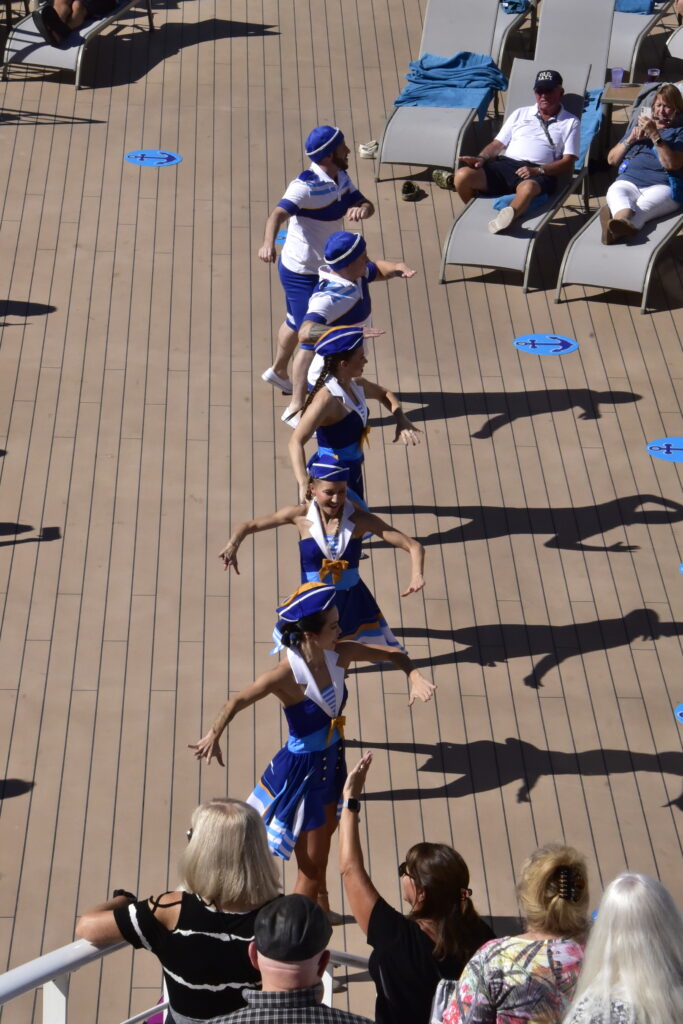 Ship's dancers performing on the pool deck at the Princess Alaskan Cruise sail-away celebration