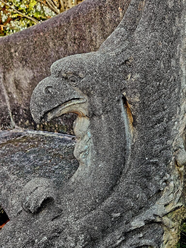 details of end of concrete bench - an eagle head