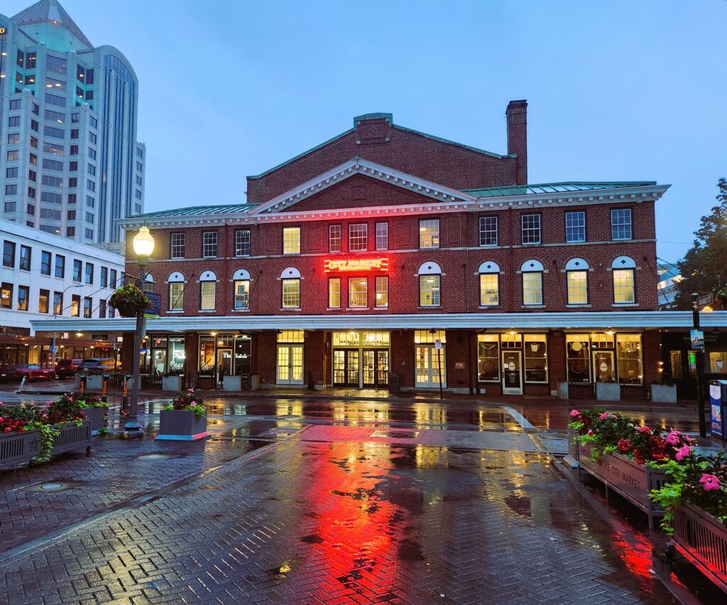 The Roanoke City Market building on a rainy night, but still lovely and filled with light.