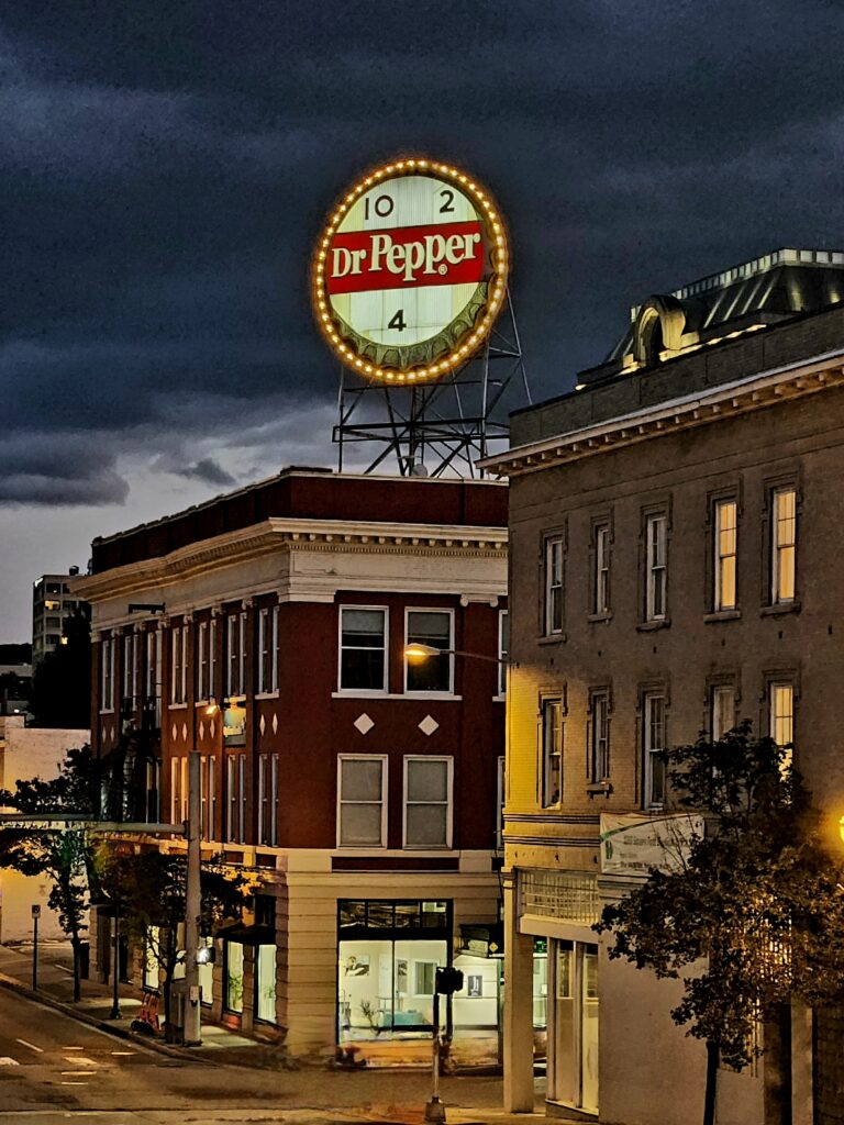 Downtown Roanoke stores, topped with a huge lighted Dr Pepper bottle cap