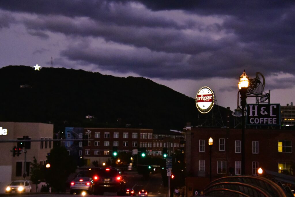 The Mill Mountain star shines brightly, meanwhile, below in downtown Roanoke the Dr. Pepper cap and H&C Coffee pot blink on.