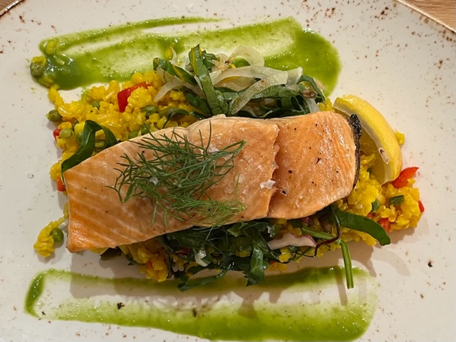 Salmon at ROAR looks delicious, and is served over corn salsa.