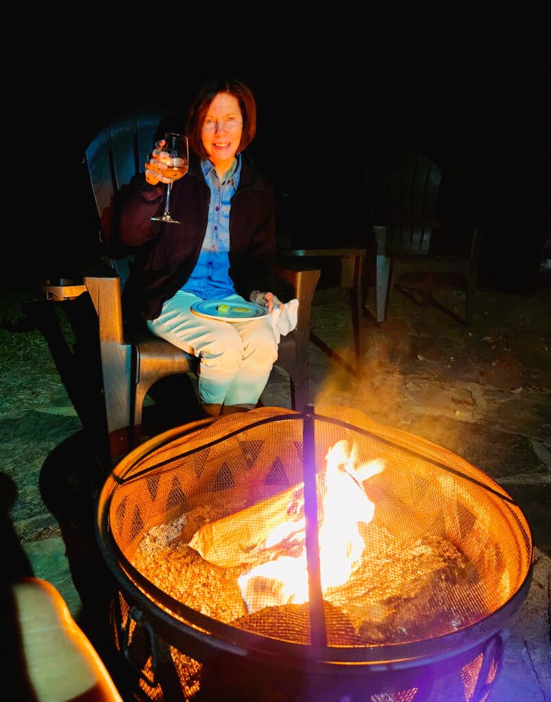 Audrey enjoying Yadkin Valley Wine, while she sits by the firepit at our cabin.
