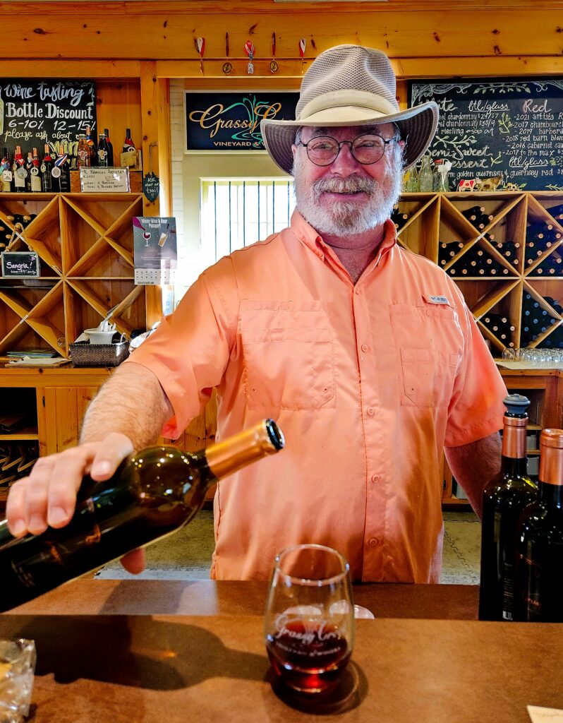 Jim Douthit shares his favorite Yadkin Valley wine, always smiling as he pours!
