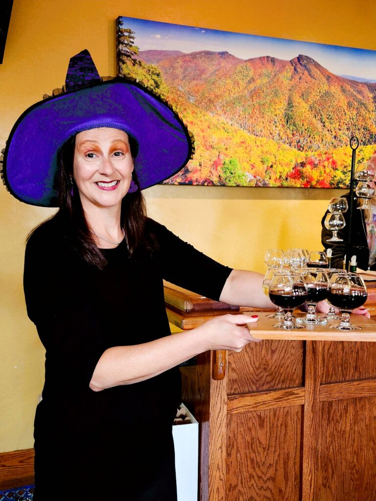 Jack's daughter, dressed as a friendly wine witch for Halloween.