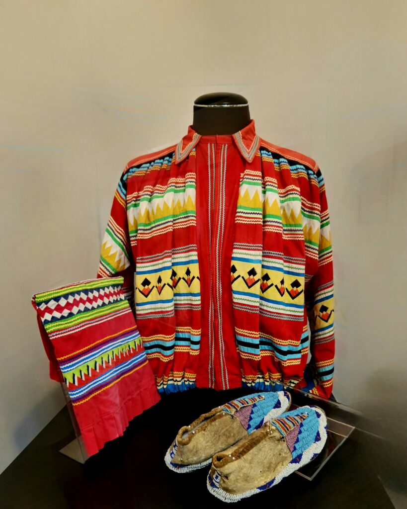 Native American beaded garments and moccasins. 
