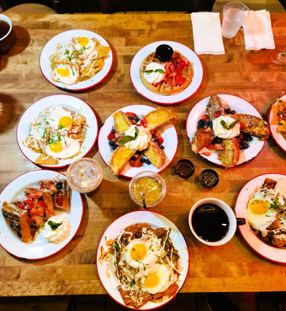 12 Ultimate Eating Stops in Buena Park and Santa Ana 39 Everyone's orders covering the table.