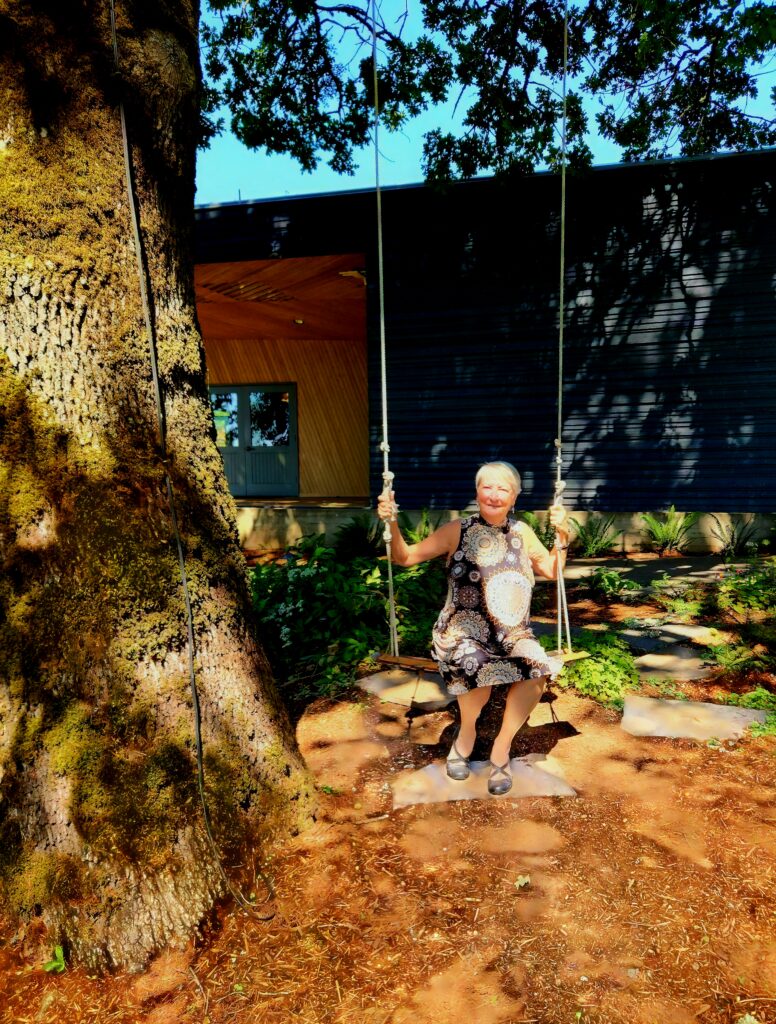 26 Sensational Must-Visit Oregon Wineries in the Willamette Valley 46 Writer in a tree swing at the winery's front porch.