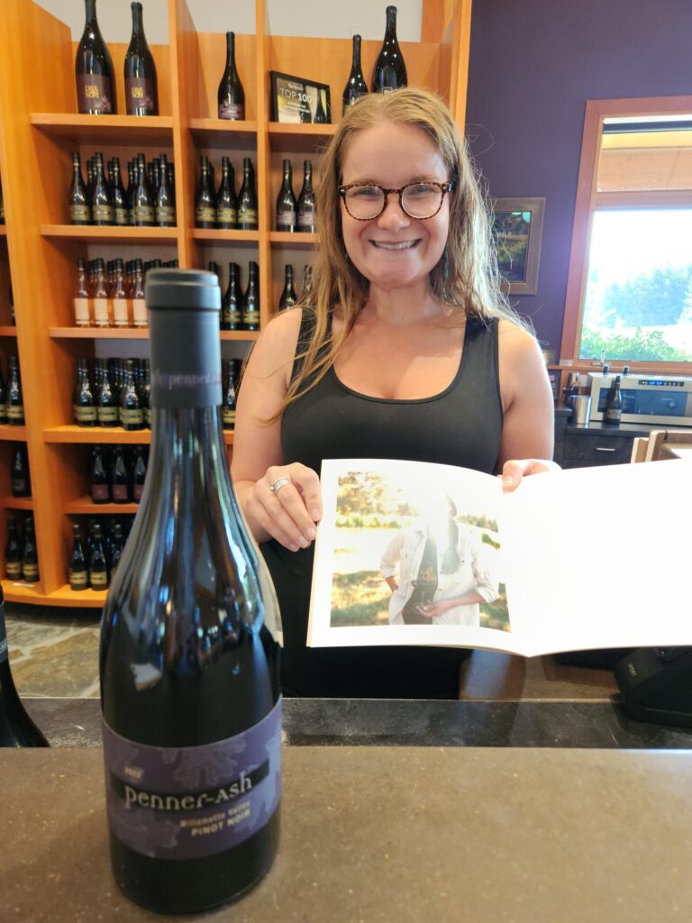 26 Sensational Must-Visit Oregon Wineries in the Willamette Valley 83 Tasting guide with a bottle of Penner Ash and the book about the wine and winemaker.