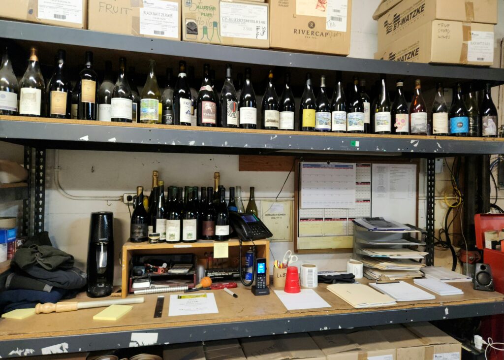26 Sensational Must-Visit Oregon Wineries in the Willamette Valley 103 50 or more bottles of wine in the warehouse on a shelf.