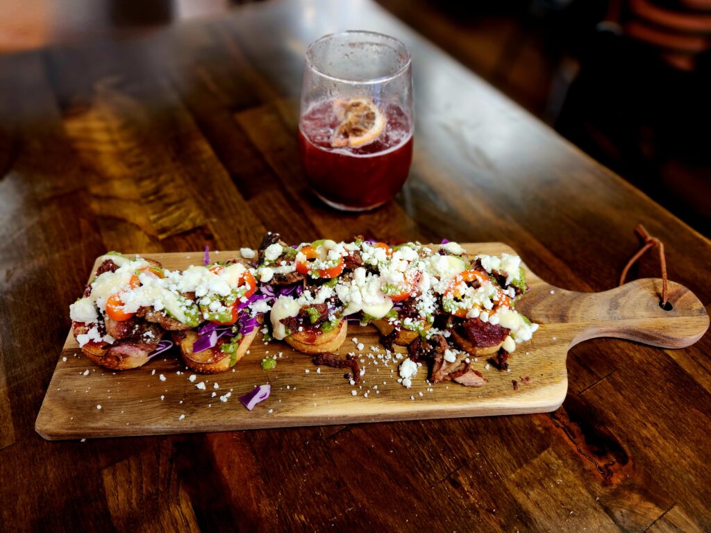 Spend 11 Awesome Days in the Willamette Valley 26 A board filled with bruchetta topped with meat, veggies and cheese.