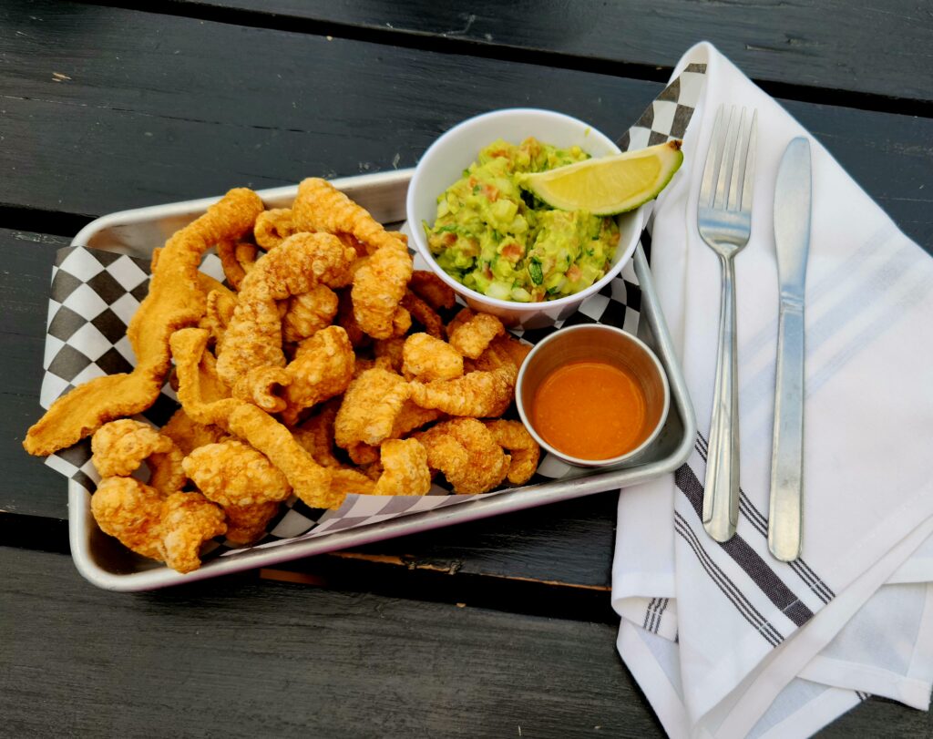 Spend 11 Awesome Days in the Willamette Valley 20 Mexican Food on a pan covered in checked paper.