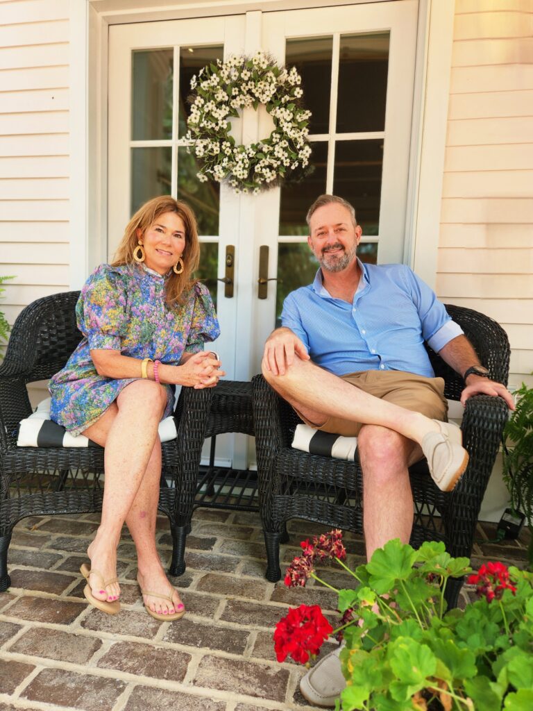 2 Islands, a Lighthouse, & Secret Magic of the Lowcountry 52 Vince and Danielle on the front porch of the In.