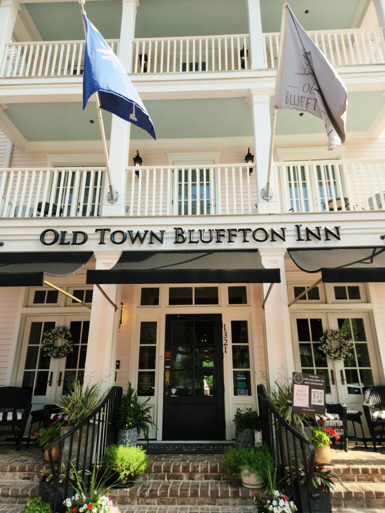 2 Islands, a Lighthouse, & Secret Magic of the Lowcountry 45 Large white three-story building = the Old Town Bluffton Inn.