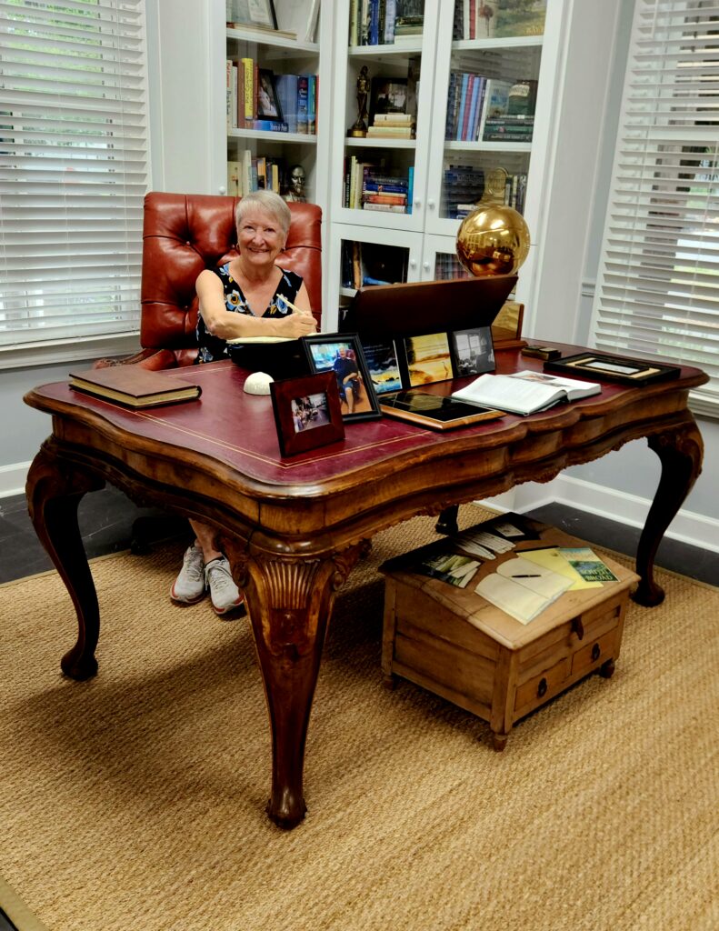 2 Islands, a Lighthouse, & Secret Magic of the Lowcountry 7 The writer, Jo, working at Pat Conroy's desk.