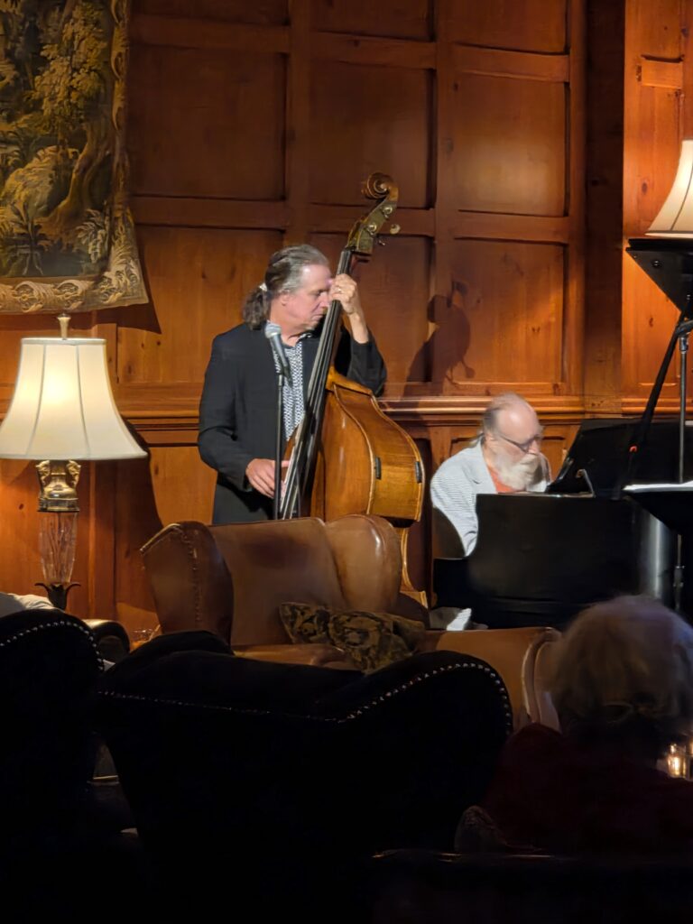 Greensboro: Big, Unexpected Adventures From 1781 Battlefield to Jeansboro 44 Jazz trio playing, showing pianist and bass player.