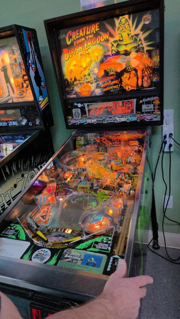 Greensboro: Big, Unexpected Adventures From 1781 Battlefield to Jeansboro 35 Colorful pinball machine.